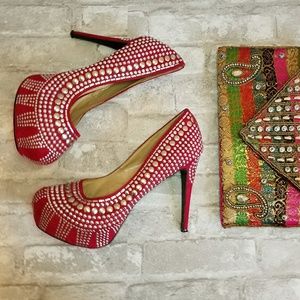 Studded fuschia heels.